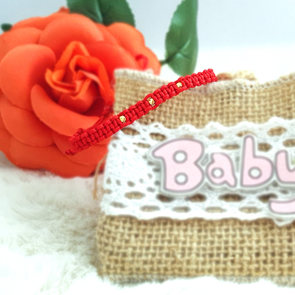 Bratara impletita manual cu ata rosie si bilute din aur 14K. Bratara pentru nou-nascuti si copii