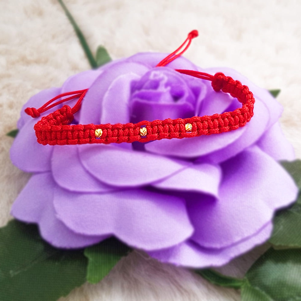 Bratara impletita manual cu ata rosie si bilute din aur 14K. Bratara pentru nou-nascuti si copii